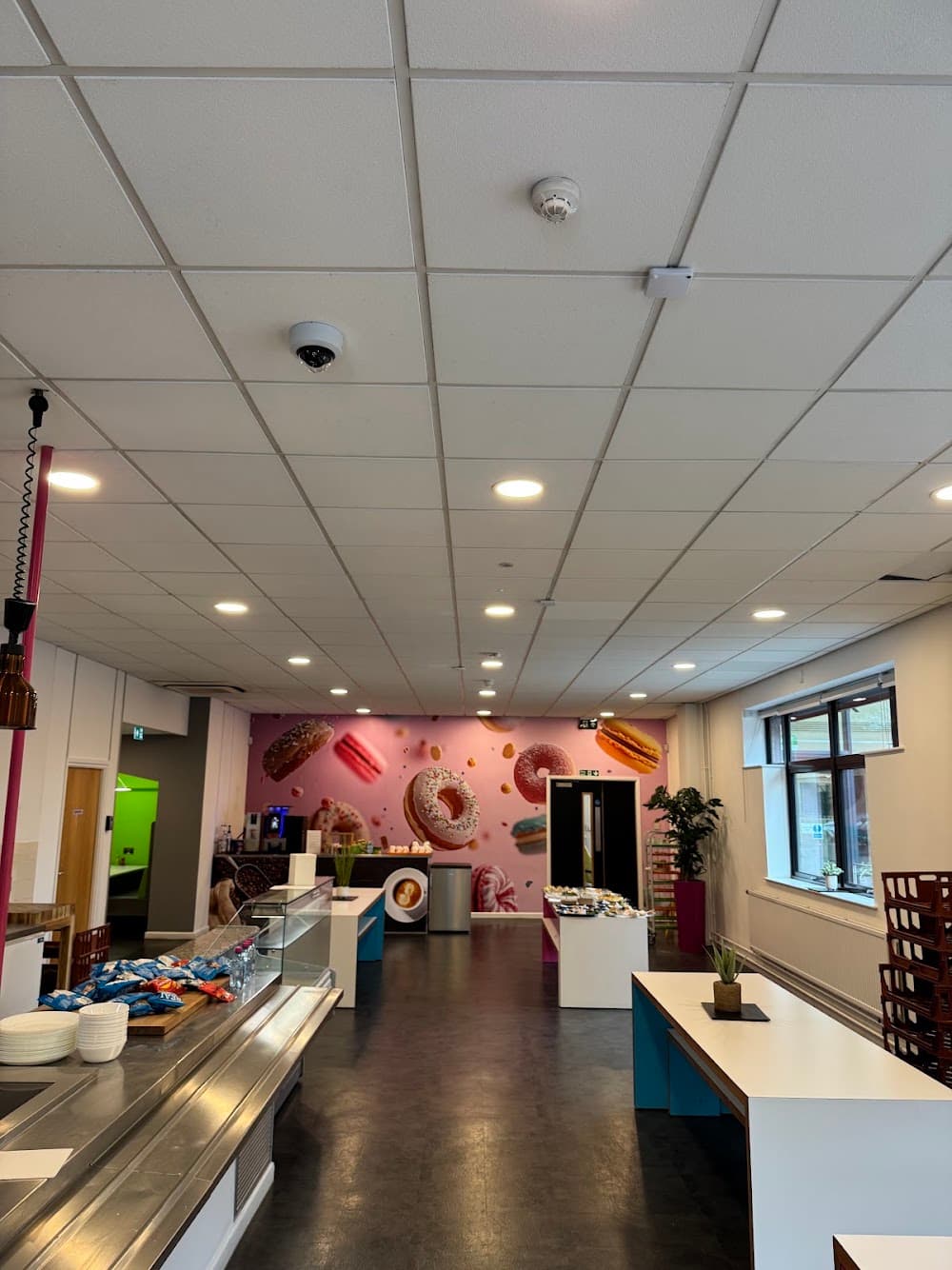Recessed LED downlighting installed throughout a staff canteen and servery area at Autodesk's Birmingham premises.