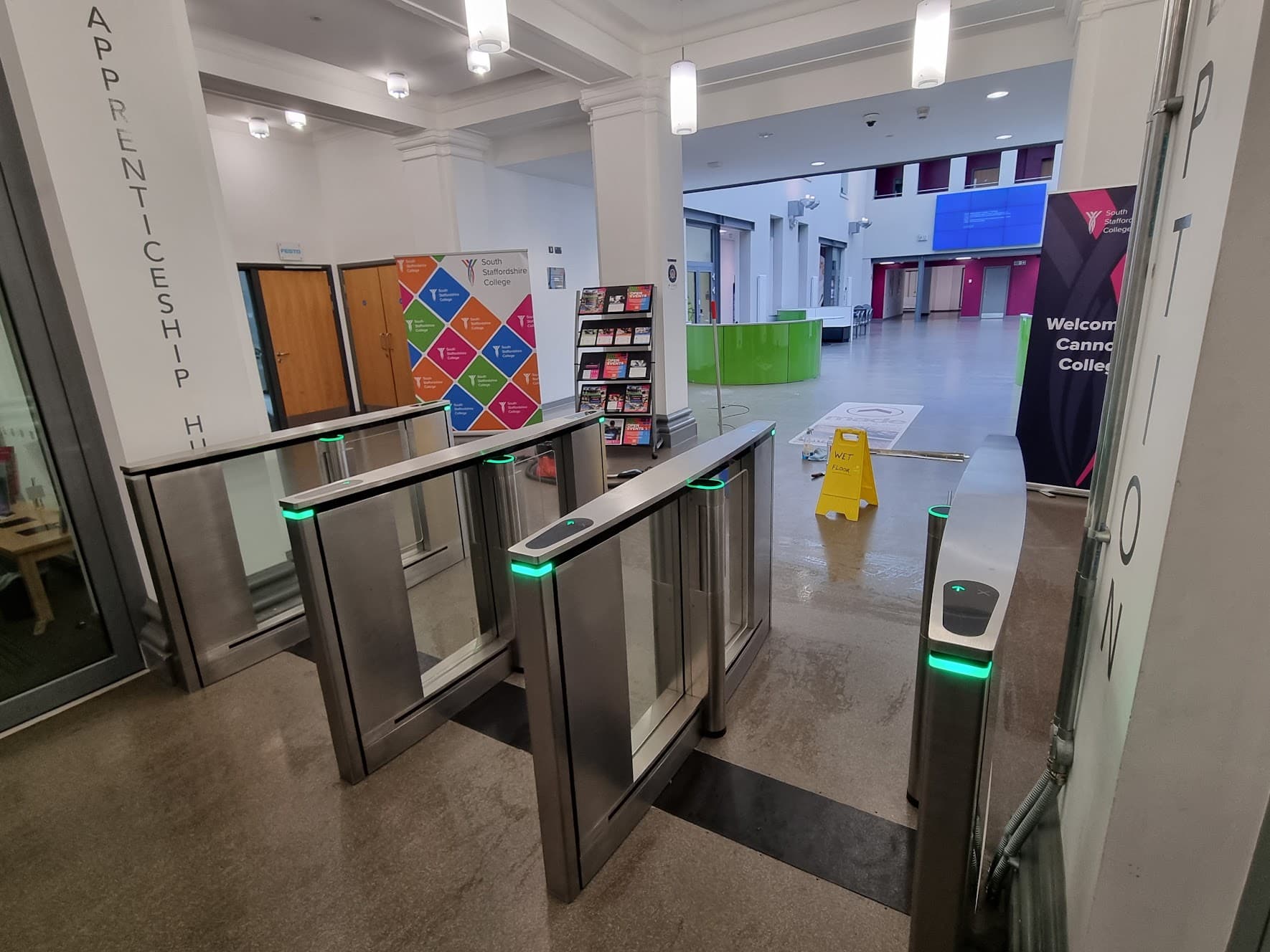 View through the completed speed-lane entrance system at South Staffordshire College's Cannock Campus, looking from the college side into the reception atrium.